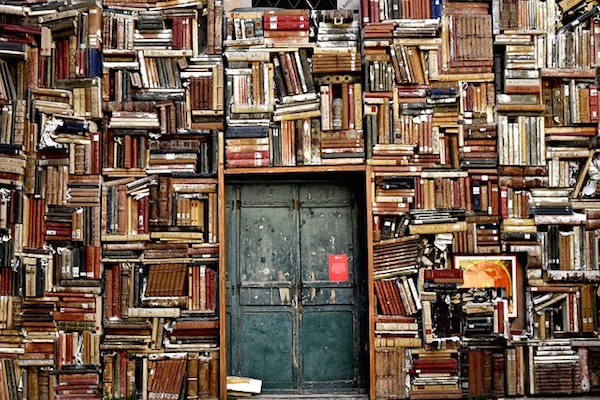 Door in a wall of books